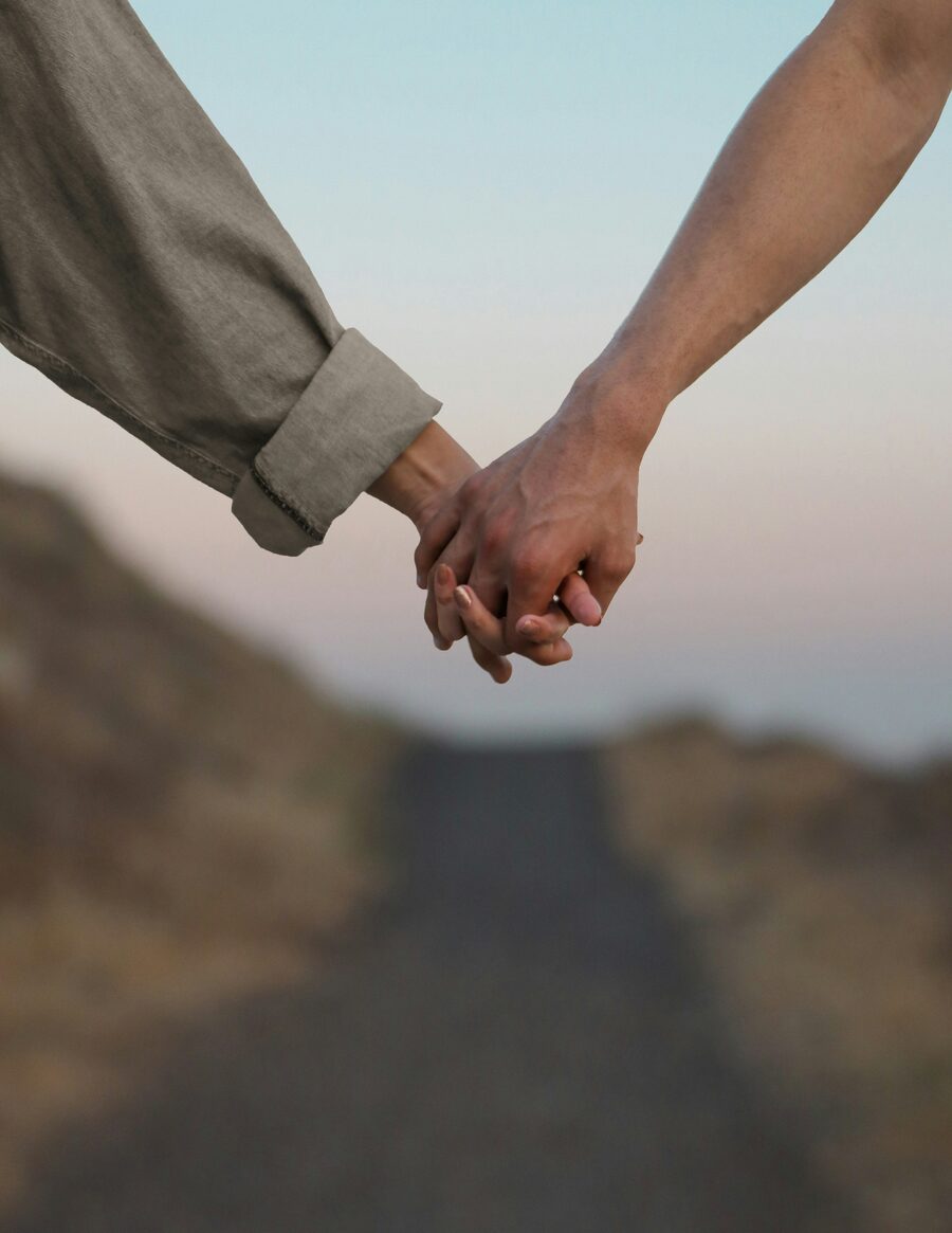 Couple holding hands